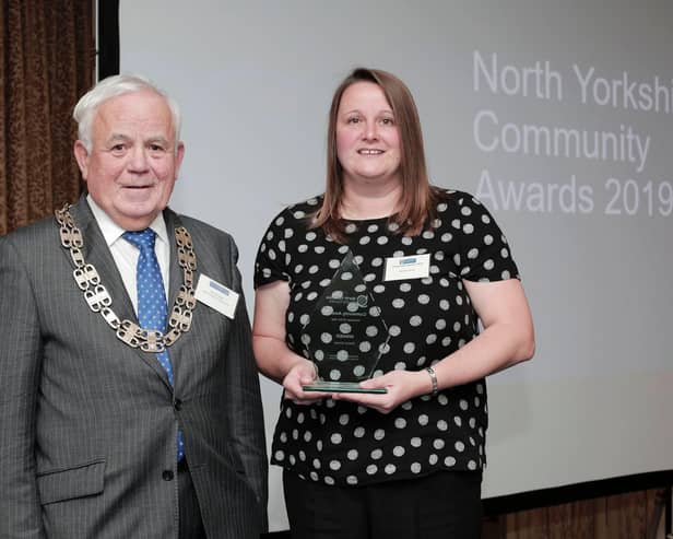 County Council chairman Cllr Jim Clark with Volunteer of the Year 2019 winner Natalie Davies