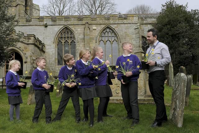 Headteacher Olly Cooper and pupils from Brompton and Sawdon County Primary School