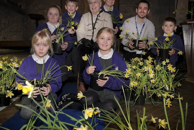 Dr Mary Jones with headteacher Olly Cooper and pupils from Brompton and Sawdon County Primary School