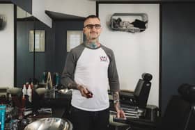 James Shane in his barber shop.