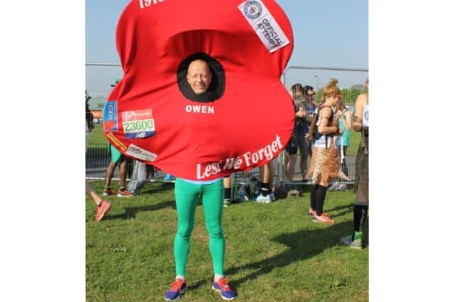 Owen dressed as a poppy!
