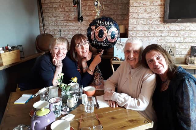 Anne Parkinson with her three daughters celebrating her 100th birthday last year.
