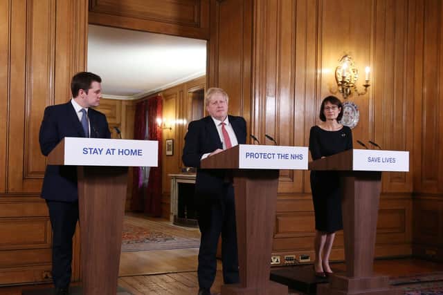 Prime Minister Boris Johnson, joined by Housing, Communities and Local Government Secretary Robert Jenrick and Deputy Chief Medical Officer Jenny Harries, speaks during a media briefing in Downing Street, London, on coronavirus (COVID-19). Photo: Ian Vogler/Daily Mirror/PA Wire