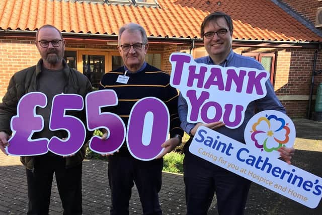 Derek Hill and Alan Waites (Flamborough Golf Club) are pictured with East Yorkshire area fundraiser for Saint Catherine’s Simon Brass.