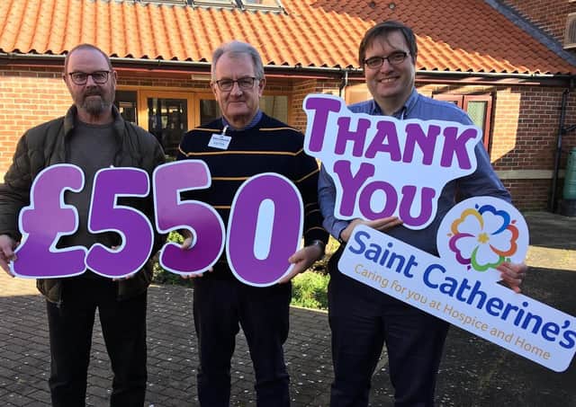 Derek Hill and Alan Waites (Flamborough Golf Club) are pictured with East Yorkshire area fundraiser for Saint Catherine’s Simon Brass.
