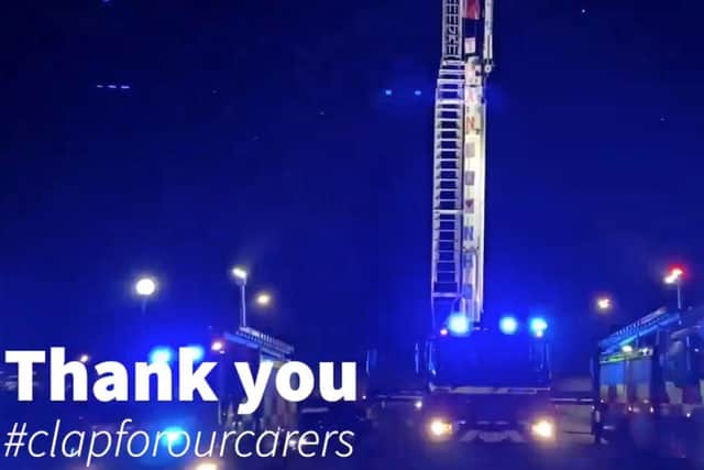 The fire service outside the hospital putting on a display of thanks.