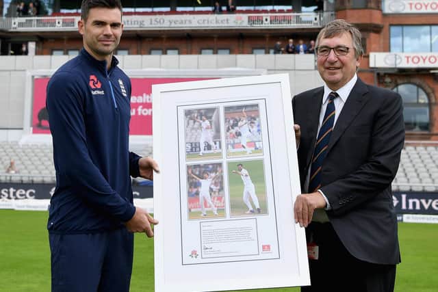David Hodgkiss, Chairman of Lancashire CCC, presents James Anderson of England with a framed photo after the naming of the James Anderson End during Day One of the 4th Investec Test between England and South Africa at Old Trafford on August 4, 2017