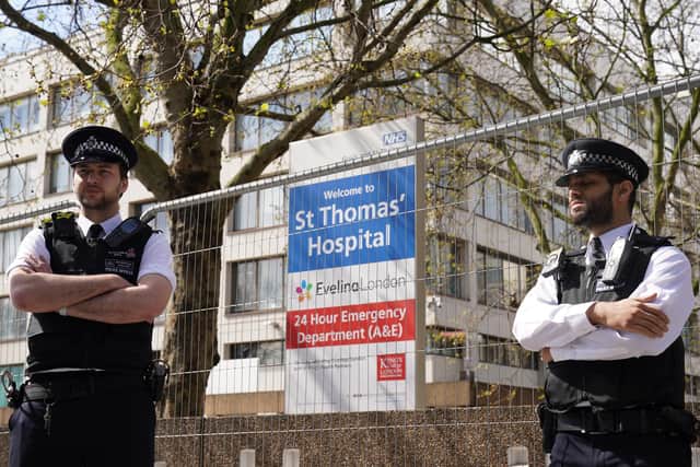 Police officers outside St Thomas' Hospital in central London where Prime Minister Boris Johnson has been admitted. Photo: PA