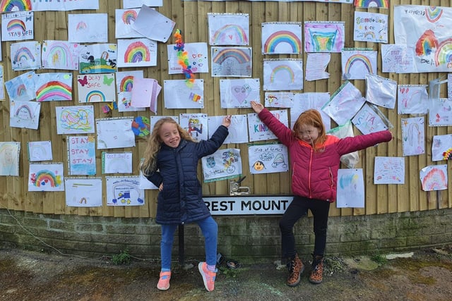 Children have created a gorgeous rainbow wall to say thanks to key workers.
The project was started by James and Rosie Binns, after James was sent home from school with flu like symptoms. In a bid to keep themselves entertained, the pair drew rainbows which were placed along their garden wall on Hillcrest Mount in Scholes.
Shortly after the family began isolating, the Government announced that schools would be closed for the majority of children.
The children decided to invite their school pals from Scholes Village Primary, to add to the rainbow wall.
James and Rosies mum, Jess said: The children go to the most wonderful, small school, theres a proper community feel to it. 
Some of the children might not get a chance to see their friends until September, so we thought the project would be a good way to bring the children together whilst following social distancing. 
The reaction weve had has been really lovely. So many people have stopped to look at the wall."