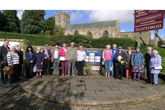 An open air meeting of library staff, parish, borough and county councillors. Taken before social distancing advice.
