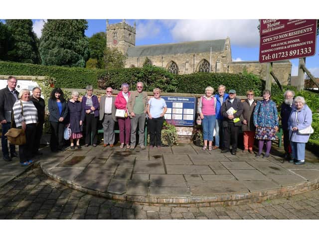 An open air meeting of library staff, parish, borough and county councillors. Taken before social distancing advice.