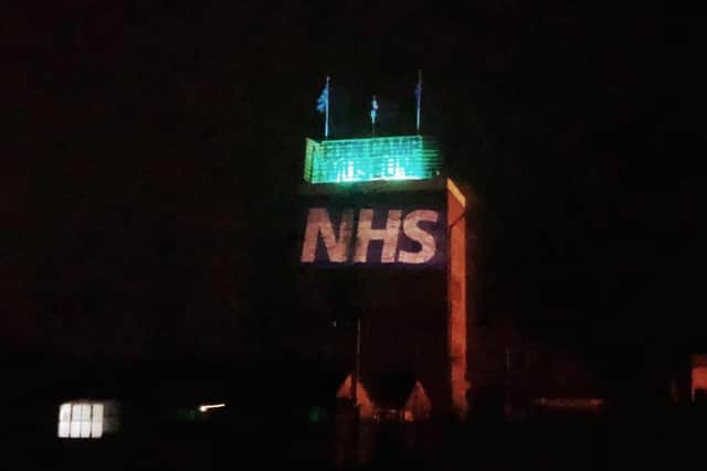 The water tower at Eden Camp illuminated.