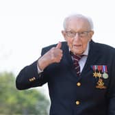 99-year-old war veteran Captain Tom Moore at his home in Marston Moretaine, Bedfordshire, after he achieved his goal of 100 laps of his garden.