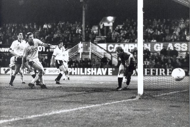 Lee Chapman looks on as the ball whistles just past the Derby County upright. Carl Shutt scored the winner at the Baseball Ground.