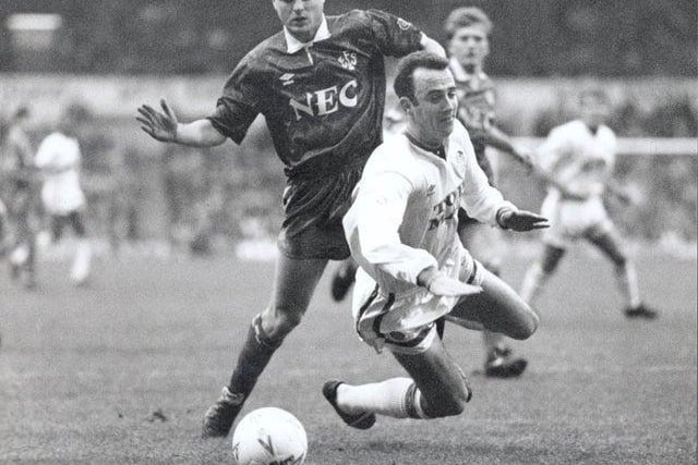 Gary McAllister is brought down in the box by Everton's John Ebbrell. Strachan converted as the Whites won 2-0. Carl Shutt scored the other goal.