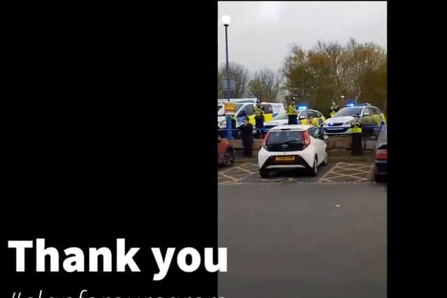 The police applauding hospital staff.