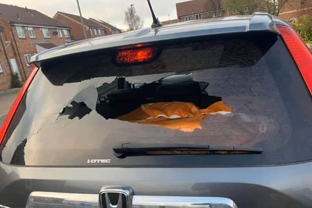 The damage to the car.