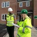 Beyond Housing staff are pictured at one of its developments.