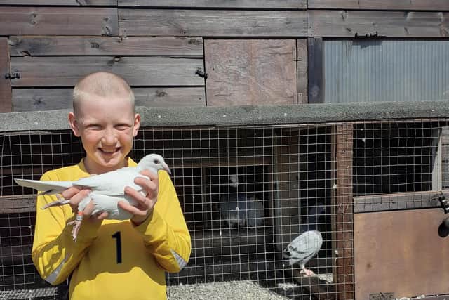 Charlie with his pigeon Beth
