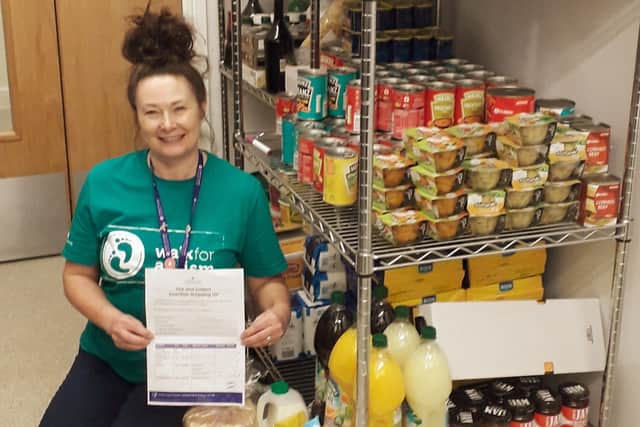 Sanctuary Retirement Living Wellbeing Assistant Tracey Potter with some of the Tick and Collect groceries.