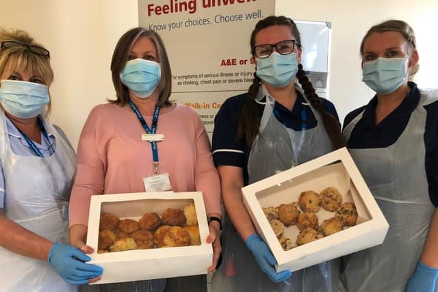 Staff at Whitby Hospital with some of the cakes and scones they have received. Left to Right - Sue Fawcett, Jill Demoily, Laura Wheeldon,Kelly Scott