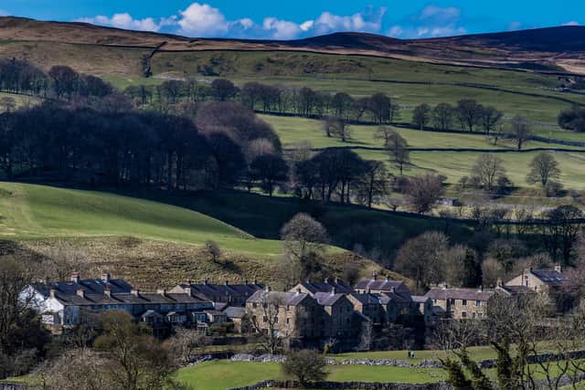 A view towards rural Dales village of Linton in Craven, located just eight miles north of Skipton, near Grassington with a population of around 176.