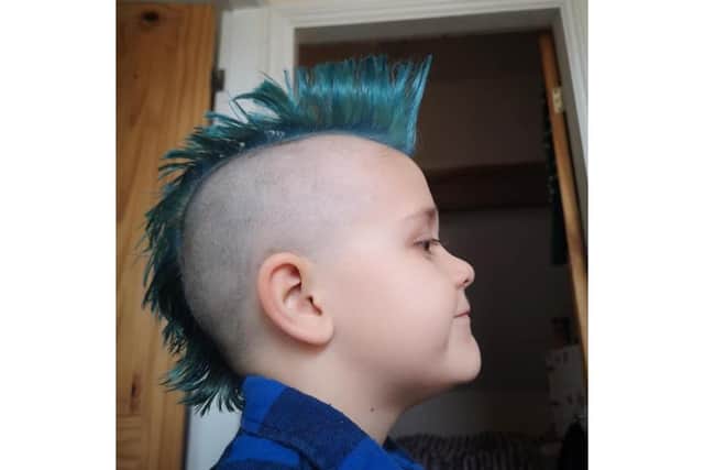 Jasper says he plans to keep the new hair style - at least for a while!
