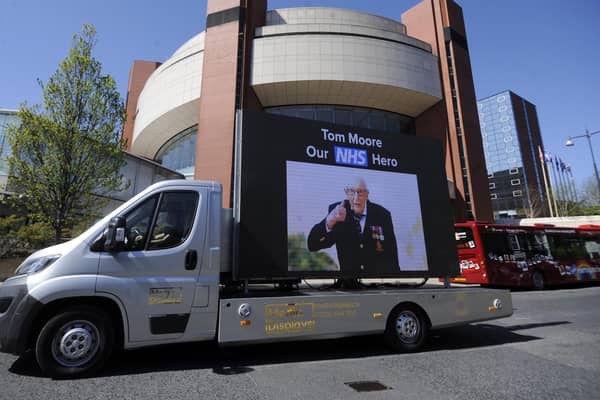 Captain Tom Moore pictured on an electronic board outside the Harrogate Nightingale Hospital.