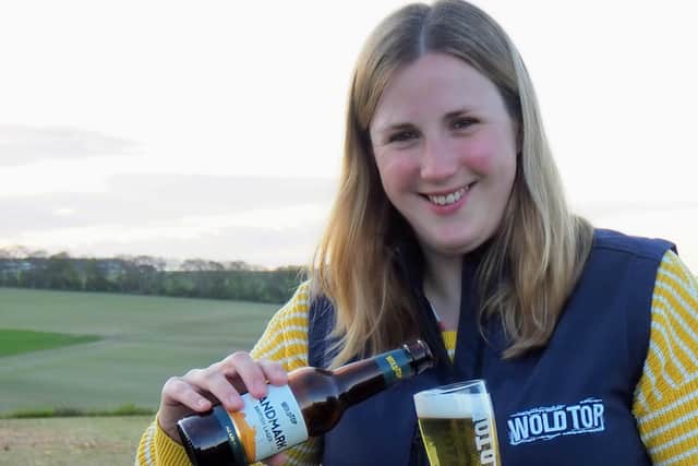 Kate Balchin with Wold Top Brewery’s new Landmark Lager.