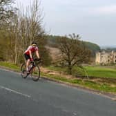 A lone cyclist rides past Barden Tower on Good Friday during the coronavirus lockdown.