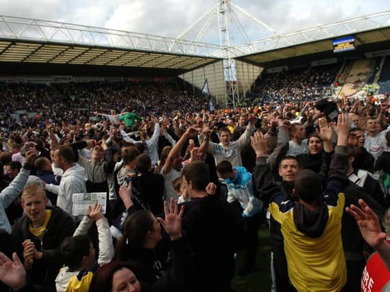 PNE fans on the pitch after victory over QPR in May 2009 saw North End make the play-offs