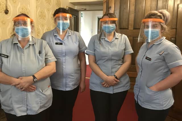 Some of The Hall’s care workers wear Tom Croft’s visors.