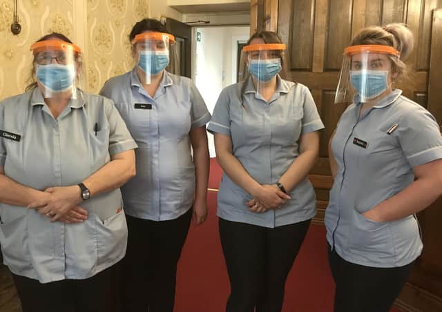 Some of The Hall’s care workers wear Tom Croft’s visors.
