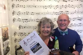Neil and Ruth Hannah with the Tune a Day Songbook