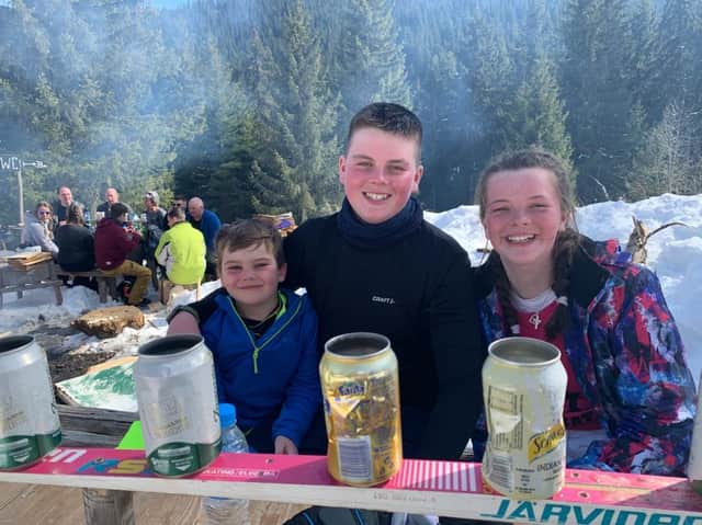 Tiernan (centre) with his brother Caelan and sister Caitlyn.