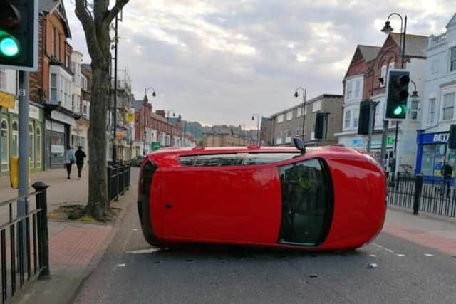 The overturned VW vehicle on Falsgrave Road.