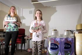 Age UK chief eExecutive Julie Hewitt with daughter Gracie-Mae Bell organising goods to disperse to the community during the pandemic