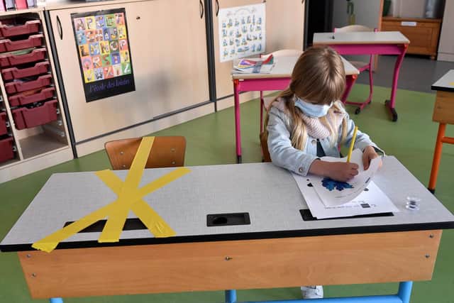 Safety measures at a school in Hannut, France. Photo: John Thys/AFP/Getty Images.