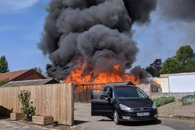 The fire engulfing a building. Picture from Andrew Stead.