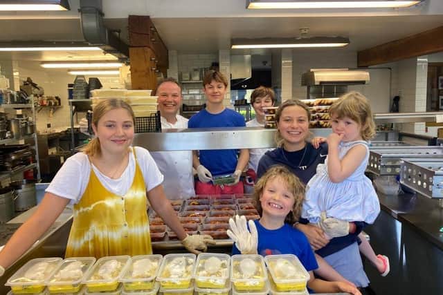 From left, Olive Pern, 14, Andrew Pern, 50, Louis Pern, 15, William Pern, 14, Tilly Pern, 19, Ferd Pern, 7, and Margot Pern, 3.
Photo: Andrew Pern/SWNS