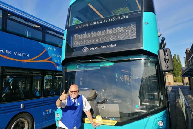 Mike Newby from bus operator Coastliner gives a thumbs-up signal as bus services increase from Sunday