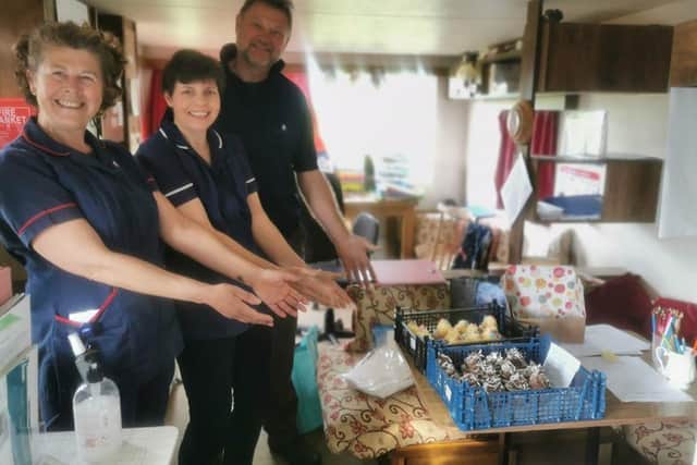 Smiling faces from Cornforth Care as the cakes arrive