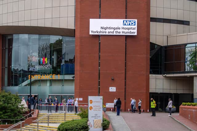 Staff at the Nightingale Hospital at Harrogate take part in a one-minute silence to mark key workers who have died in the pandemic.
