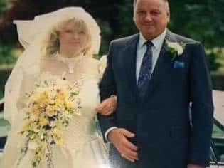 Mikki with her father on her wedding day in 1987.
