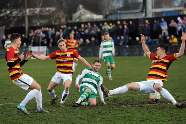 Cartman gets a shot away for Farsley against Bradford Park Avenue last season