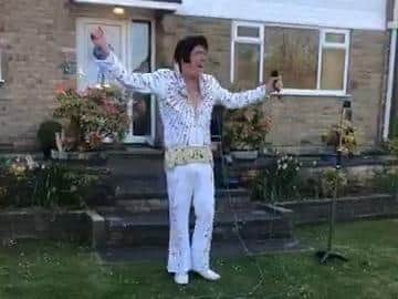 Tony Skingle performing in his garden