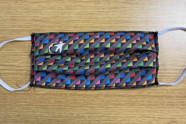 Bus operator Coastliner is selling this designer face covering in the colours of
each of its sister companies across the North, in aid of NHS Charities Together.
