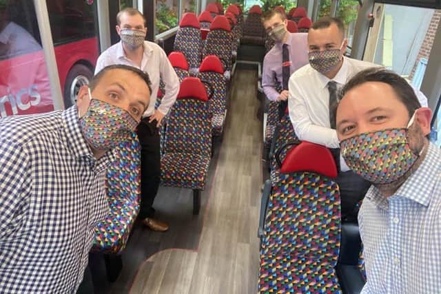 Coastliner Operations Director Vitto Pizzuti (front left) and CEO Alex Hornby (front right) with the bus firms team sporting its specially designed face coverings in the colours of each of parent company Transdevs bus operators across the North.