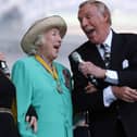 Dame Vera Lynn (centre), Petula Clark (left) and Bruce Forsyth singing "We'll Meet Again" during the World War II 60th Anniversary Service at Horse Guards Parade, London. Edmond Terakopian/PA Wire