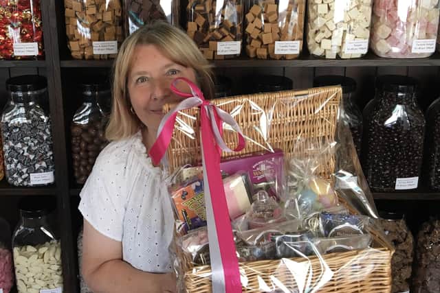 Lynn Hempsall, at Helmsley Traditional Sweet Shop, is selling raffle tickets for the amazing hamper. Photo submitted
